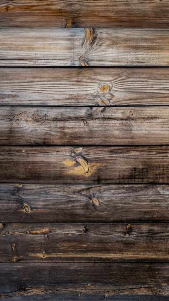 High-resolution image of rustic, weathered wooden planks for background use.